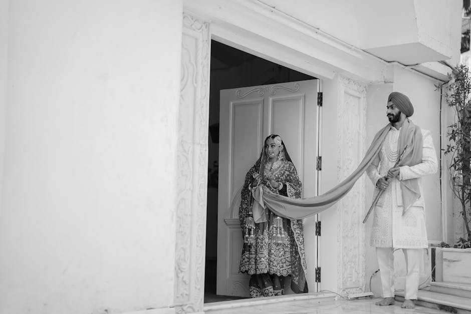 A bride and groom in traditional attire during an Indian wedding ceremony.
