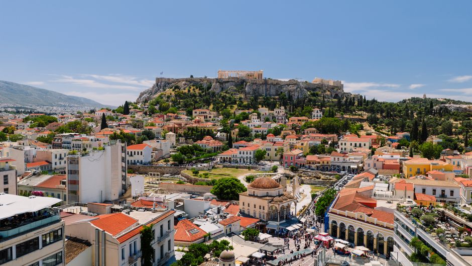 Scenic aerial view of Athens, Greece, showcasing the Acropolis and surrounding architecture.
