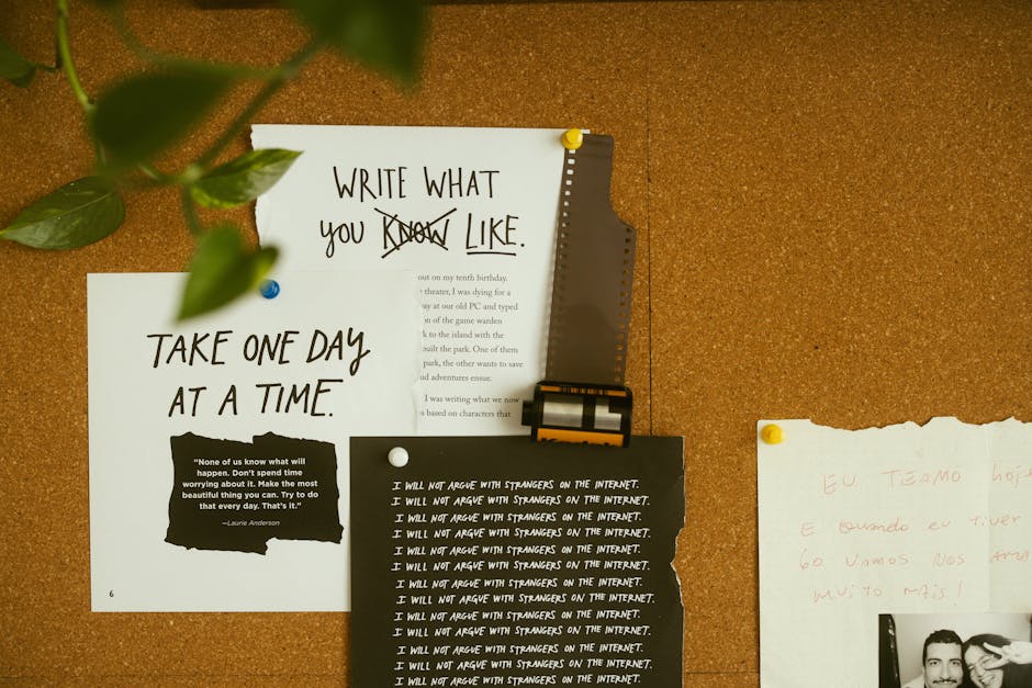 A corkboard with motivational quotes, notes, and film negatives, fostering creativity and reflection.